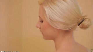 Girl plays with a brush in her mouth and cums