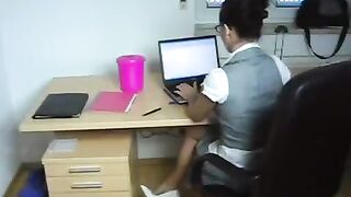 The young secretary has sex with her boss directly at work