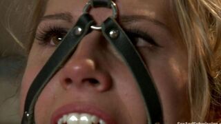 A girl is tied up and used as a slave in a hardcore BDSM scene