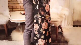 Redhead slut in long black dress, high heels and stockings, gets fucked