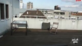Brunette with big tits bounces on the roof in POV