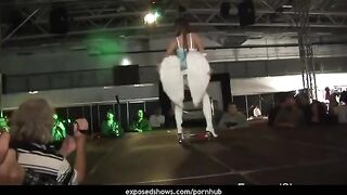 Hot brunette learns to dance on the strip pole