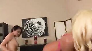 Two hot lesbians are having fun with each other using a grinder