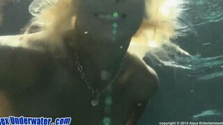 Blowjob scene with a girl wearing a bikini in the pool