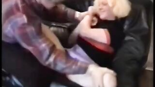 A chick is having fun with her boyfriend on a motorcycle