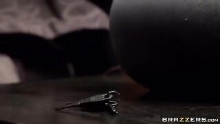 BDSM bondage with a girl attached to the bed
