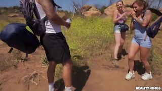 Group sex after a hike. A sexy girl was taken by some guys in the woods