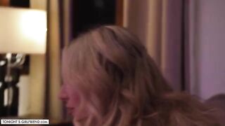 Kayley Gunner, in sexy pink stockings, gives a foot job to her fan