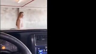 Redhead babe flashes her cunt in the public garage and gets fucked