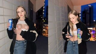 A cute girl showed more than her tits for an energy drink advertisement