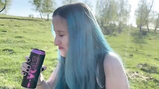 A girl is having fun with her classmate outdoors, exploring new sensations