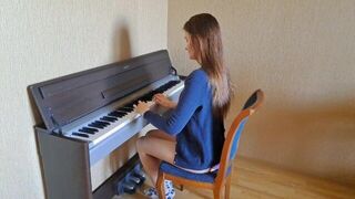 An innocent girl is playing with a guy’s cock in a sensual scene