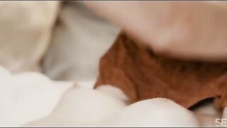 The lesbians are gentle with each other, showing tender moments on the bed