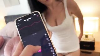 The remote control of the butt plug makes the girl go crazy and she comes