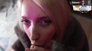 The saliva flows down the chin in sync with her movements