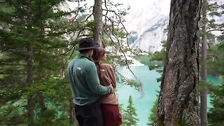 A couple makes love in the forest, overwhelmed by sensory experiences