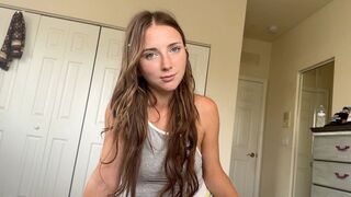 The girl shows her hole in one piece of clothing less than a second