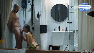 A couple enjoys intimate moments in the shower stall, exploring every inch with passion