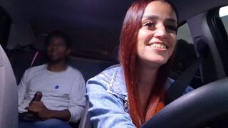 A hot chick is having fun with her boyfriend in the car