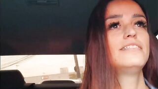 A hot chick is having fun with her boyfriend in the car