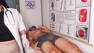 A doctor conducting an oral examination in a hospital can be quite intense