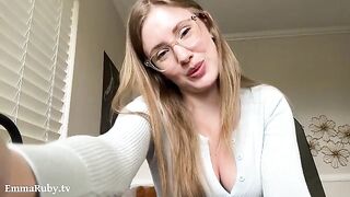 A girl with glasses silently fucks herself, showcasing her sexy tattoos