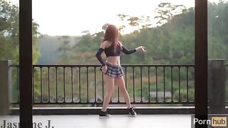 A cute Asian girl, Jasmine J, gets fucked by a machine on her balcony
